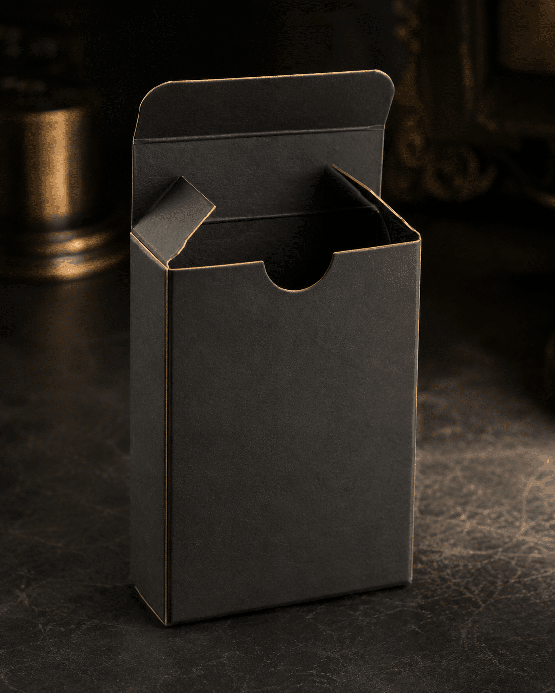 Open black straight tuck end folding carton with thumb notch for cosmetic and retail packaging